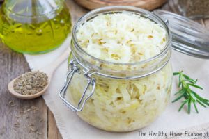 Homemade sauerkraut with cumin in a glass jar