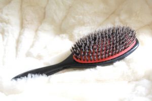 nylon brush or a boar bristle